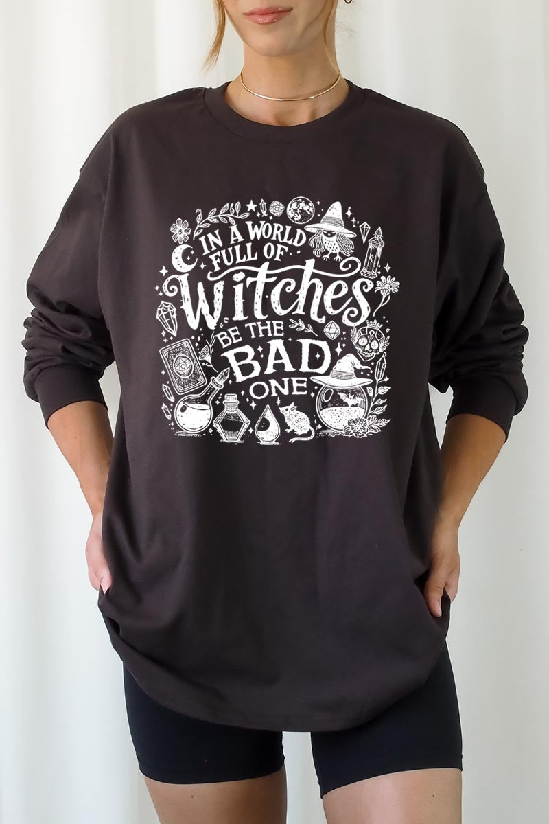 UL240-E3139 In a World of Witches Graphic Long Sleeve Tee $13.75