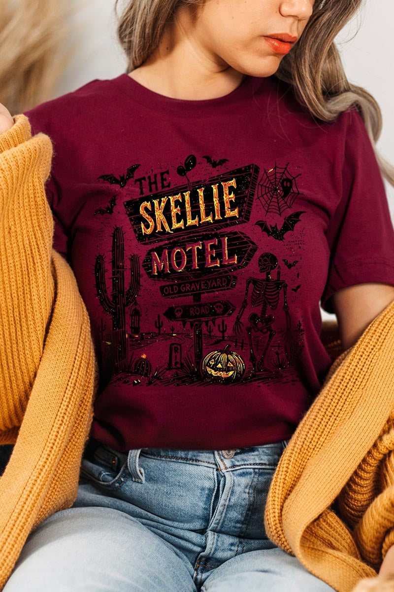 US3001P-E3108 Skellie Motel Halloween Graphic Plus Tee $16
