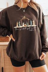 UL180P-E3183 Nativity Gift Graphic Plus Sweatshirt $25