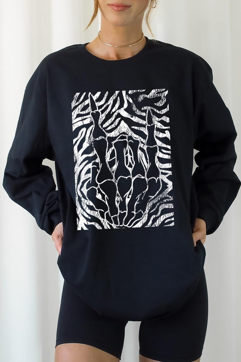 UL240-E3177 Skeleton Hands Zebra Graphic Long Sleeve Tee $13.75