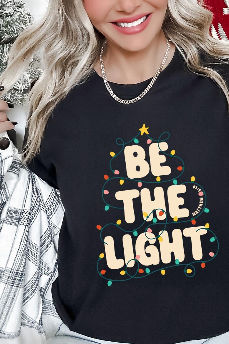 US3001-E3202 Be the Light Christmas Graphic Tee $12.5