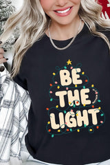 US3001P-E3202 Be the Light Christmas Graphic Plus Tee $16