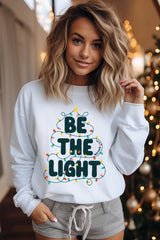 UL180P-E3202 Be the Light Christmas Graphic Plus Sweatshirt $25