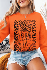 UL180-E3177 Skeleton Hands Zebra Graphic Sweatshirt $20