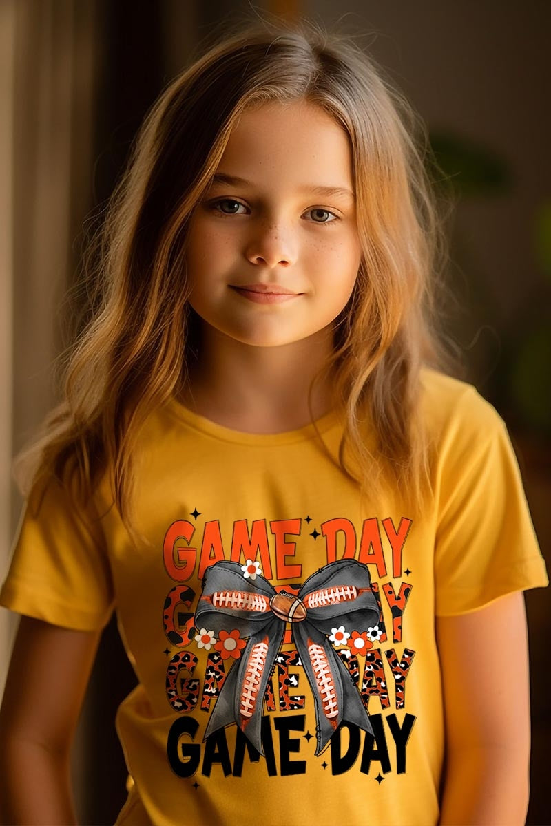 US3001Y-E3088Z Orange Black Football Game Day Bow Kids Tee $11