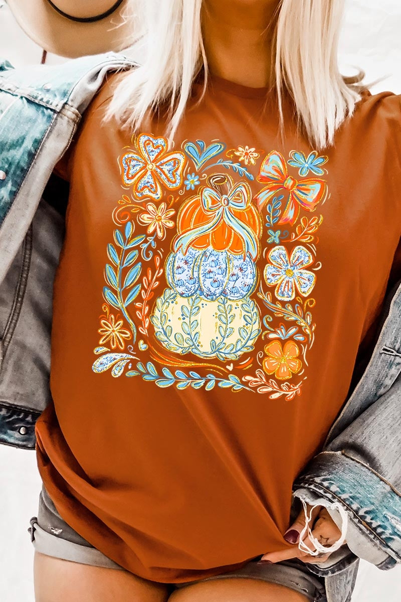 US3001P-E3153 Floral Pumpkin Stack Graphic Plus Tee $16