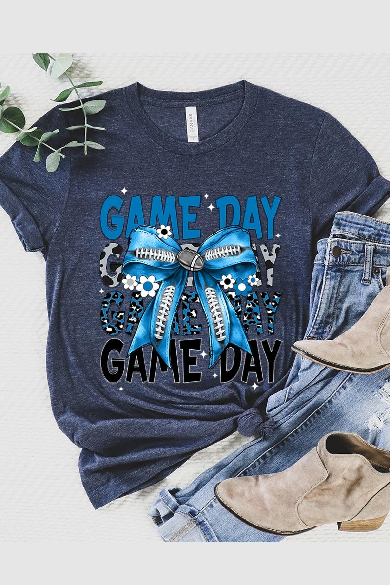 US3001P-E3089 Blue Silver Football Game Day Bow Graphic Plus Tee $16