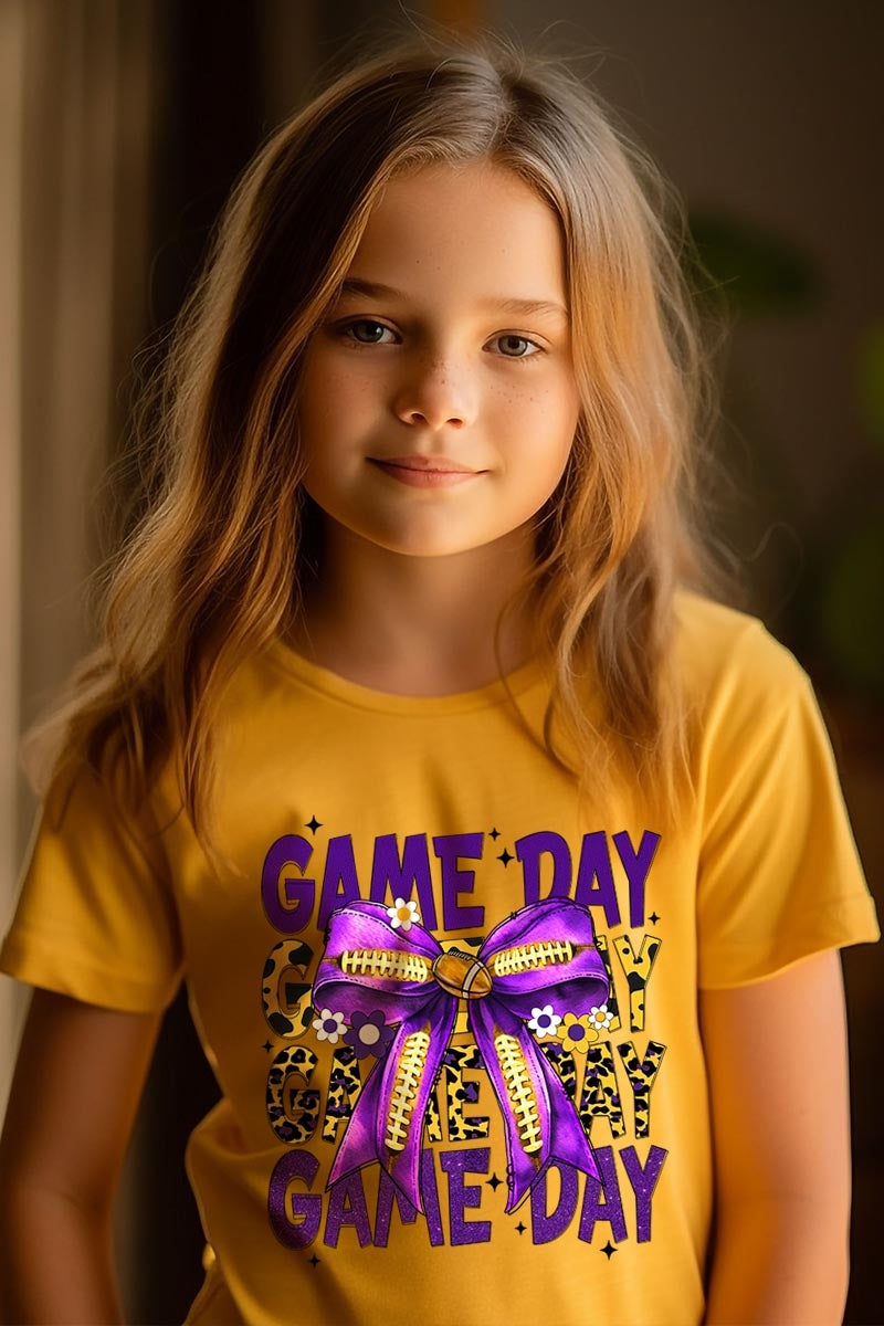 US3001Y-E3092Z Purple Yellow Football Game Day Bow Kids Tee $11