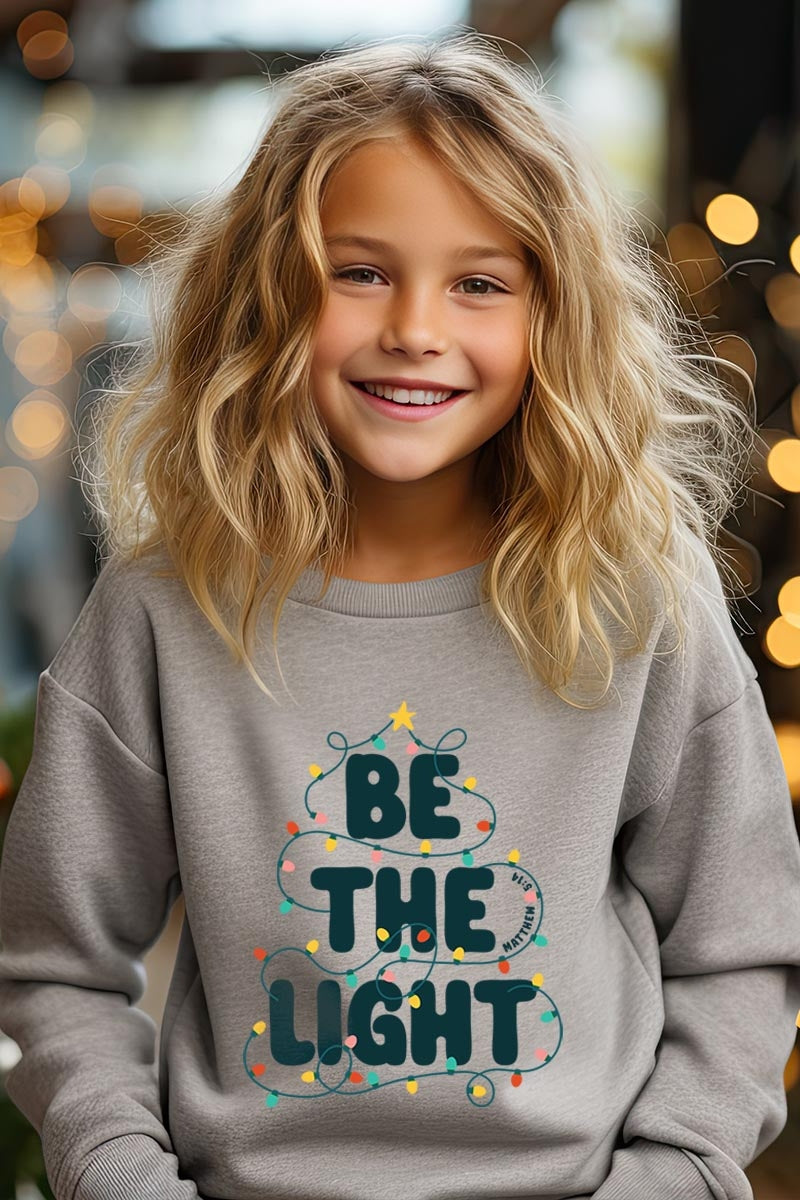 UL180B-E3202Z Be the Light Christmas Kids Graphic Sweatshirt $20