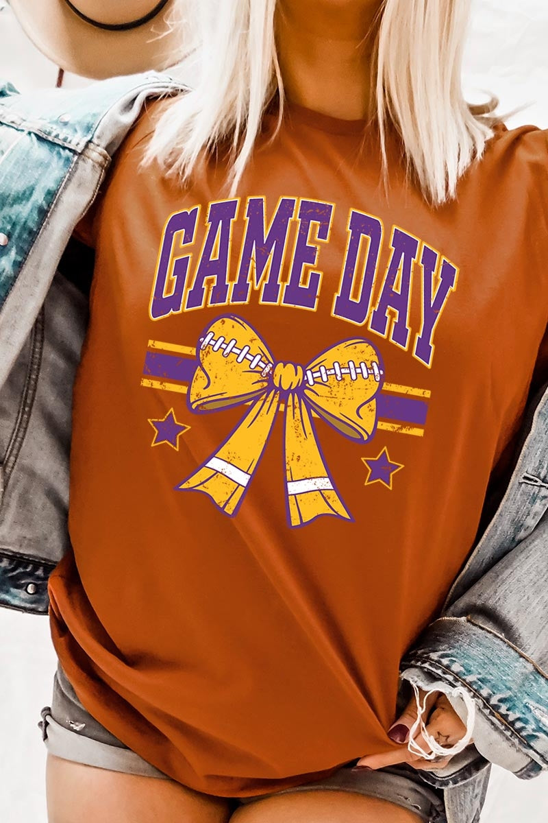 US3001P-E3063 Purple Game Day Football Bow Graphic Plus Tee $16