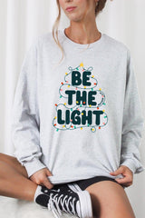 UL240-E3202 Be the Light Christmas Graphic Long Sleeve Tee $13.75