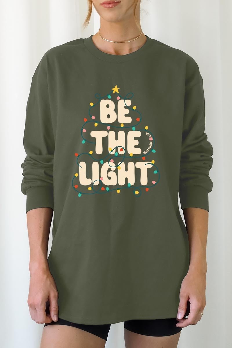UL240-E3202 Be the Light Christmas Graphic Long Sleeve Tee $13.75