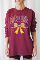 UL240-E3063 Purple Game Day Football Bow Long Sleeve Tee $13.75