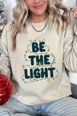 UL180-E3202 Be the Light Christmas Graphic Sweatshirt $20