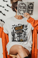 US3001P-E3108 Skellie Motel Halloween Graphic Plus Tee $16