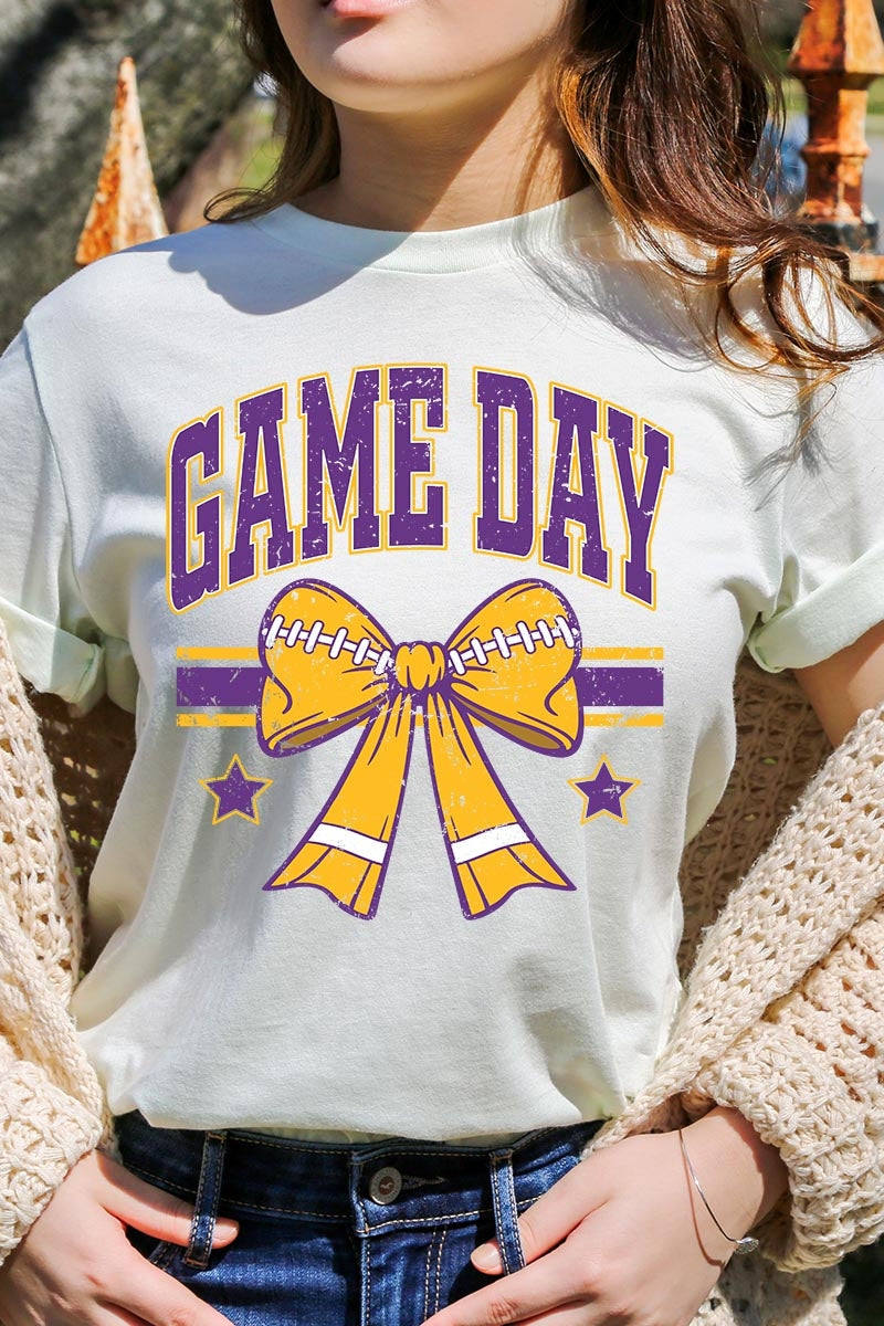 US3001P-E3063 Purple Game Day Football Bow Graphic Plus Tee $16