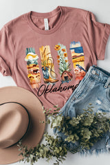 US3001P-E3061OK Oklahoma State Brushstroke Graphic Plus Tee $16