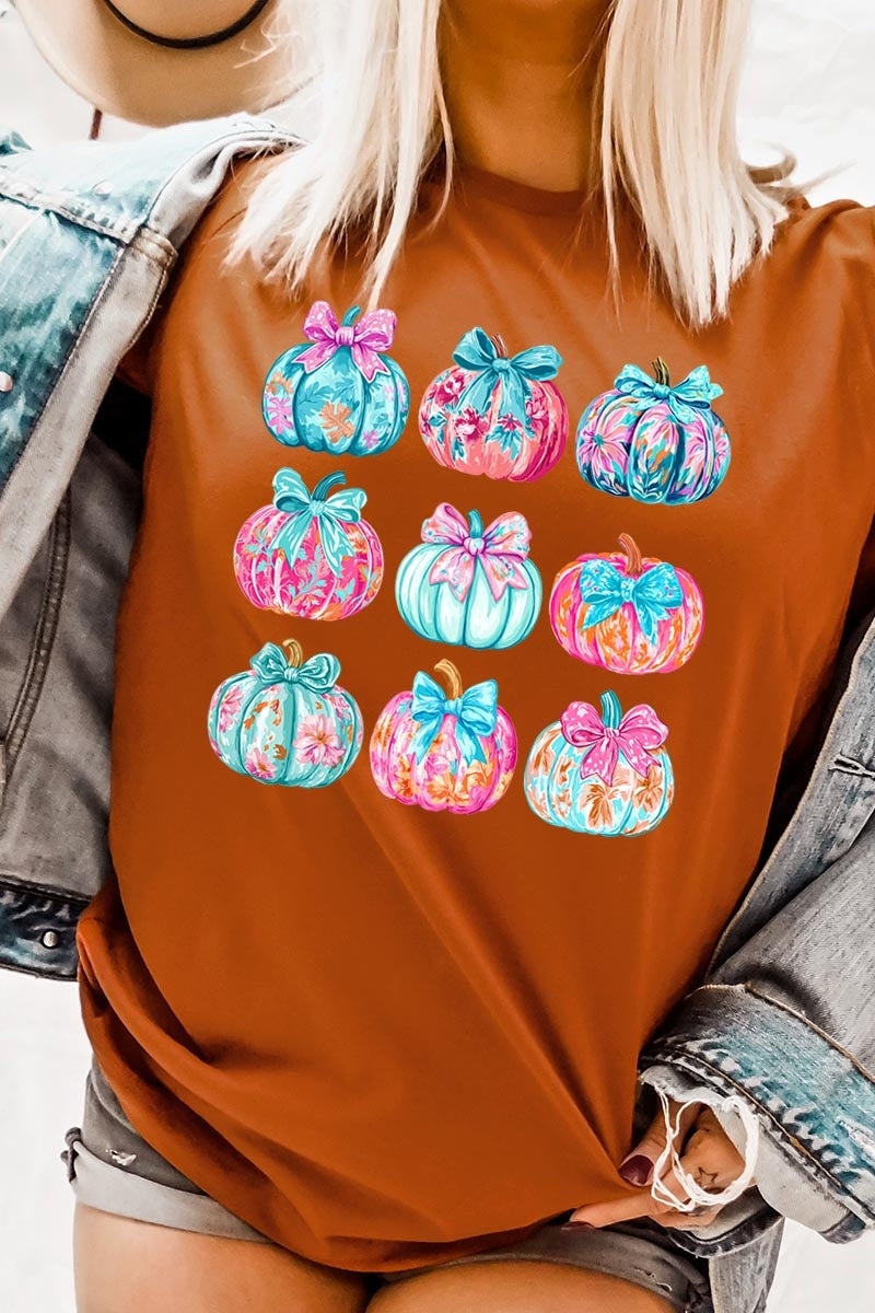 US3001P-E3137 Coquette Pumpkin Graphic Plus Tee $16