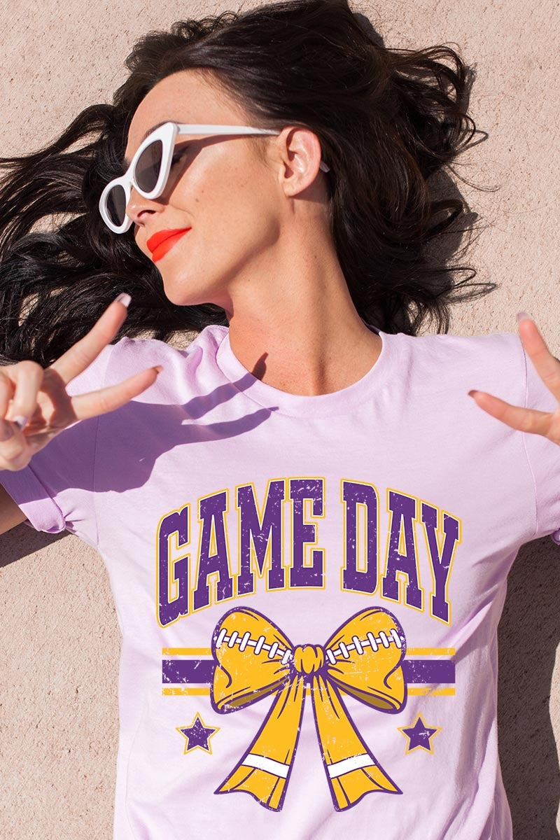 US3001-E3063 Purple Game Day Football Bow Graphic Tee $12.5