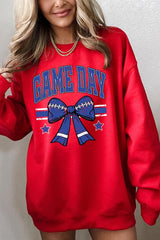UL180P-E3065 Blue Game Day Football Bow Graphic Plus Sweatshirt $25