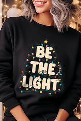 UL180P-E3202 Be the Light Christmas Graphic Plus Sweatshirt $25