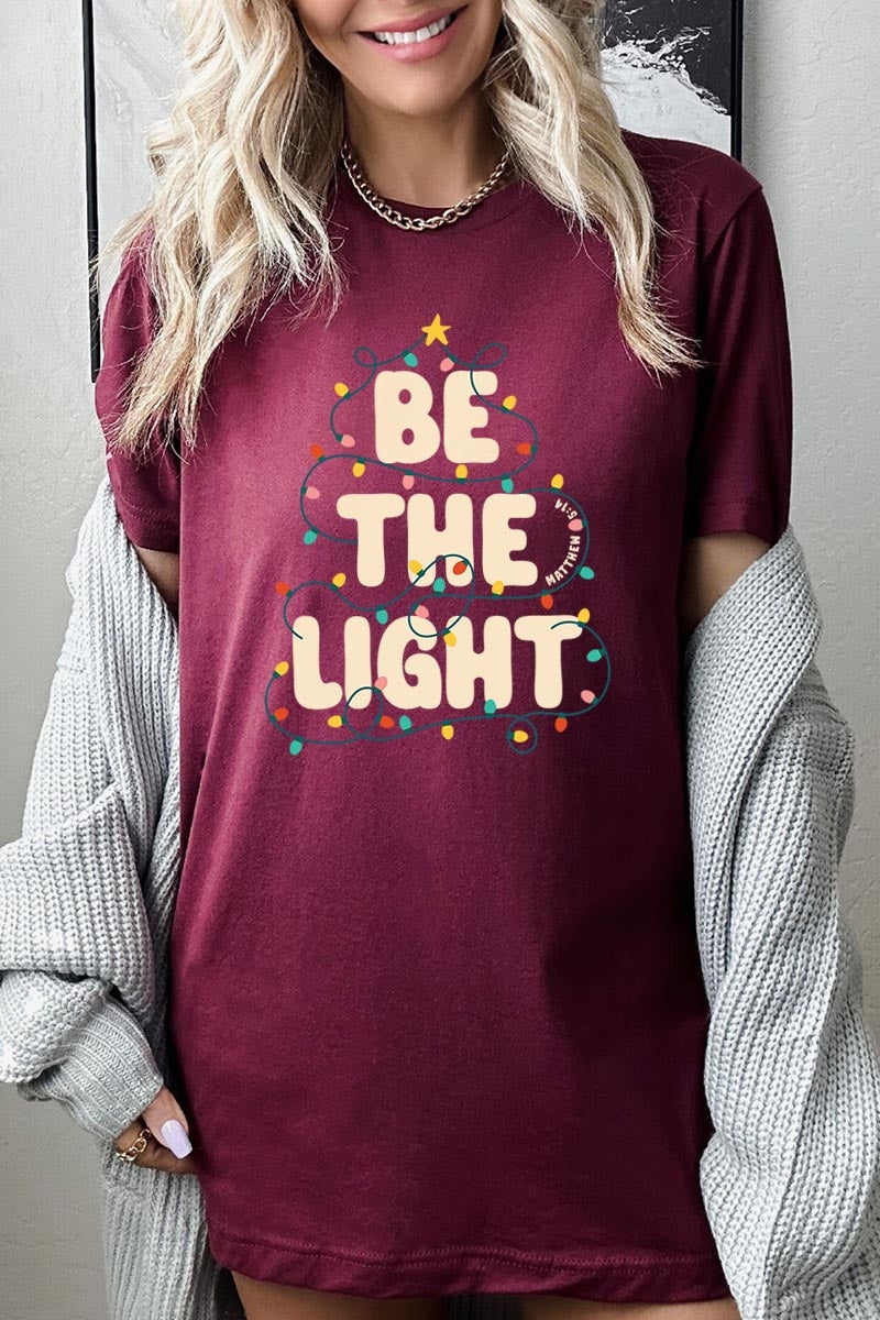 US3001P-E3202 Be the Light Christmas Graphic Plus Tee $16