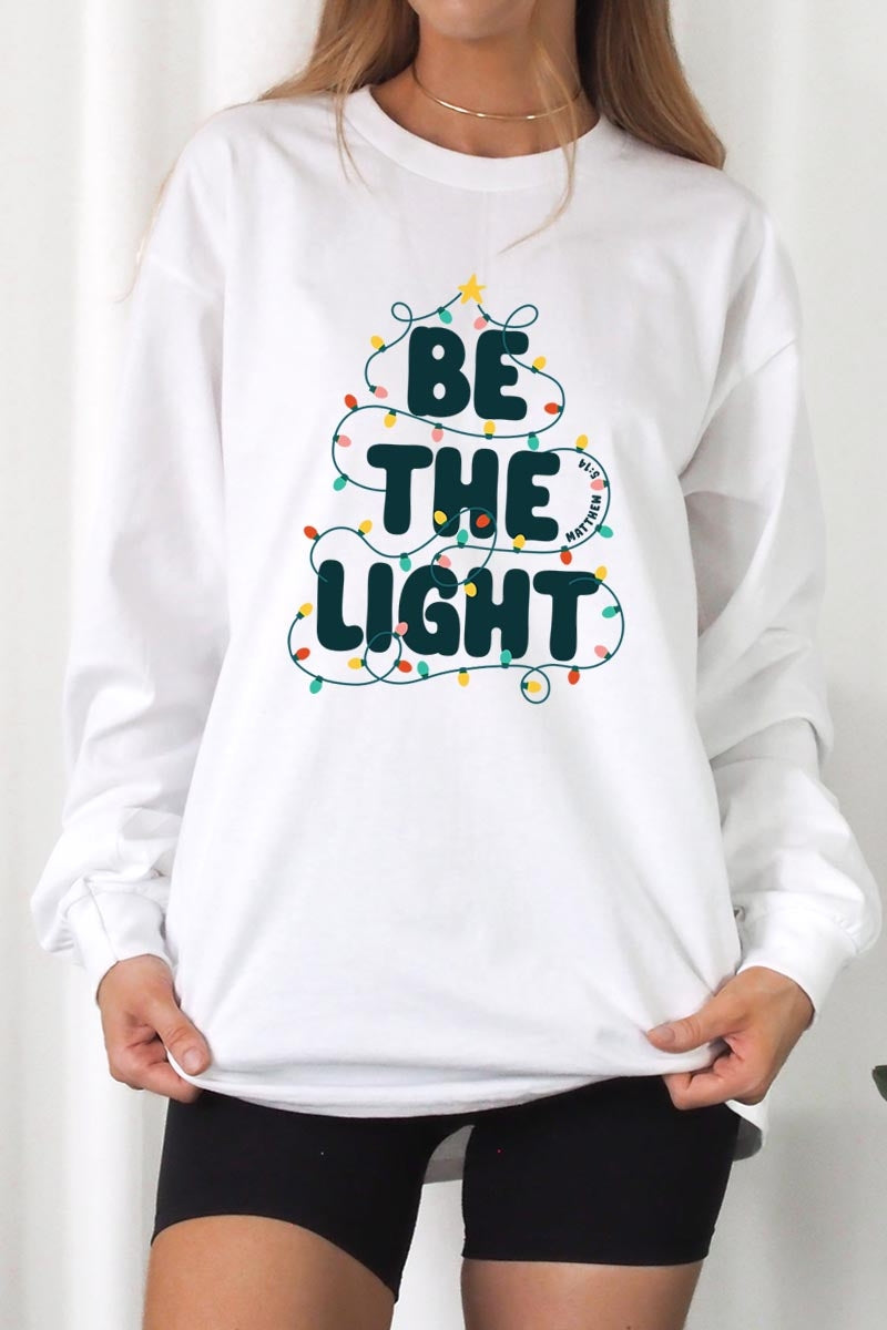 UL240-E3202 Be the Light Christmas Graphic Long Sleeve Tee $13.75