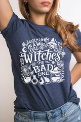 US3001-E3139 In a World of Witches Graphic Tee $12.5