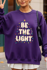 UL180P-E3202 Be the Light Christmas Graphic Plus Sweatshirt $25