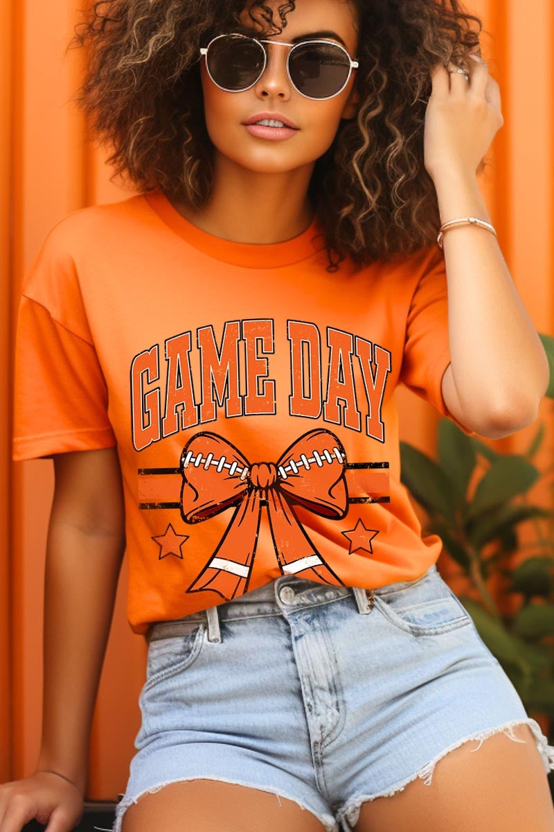 US3001P-E3064 Orange Game Day Football Bow Graphic Plus Tee $16