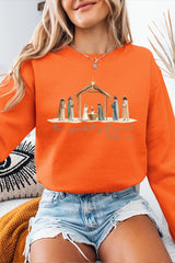 UL180-E3183 Nativity Gift Graphic Sweatshirt $20