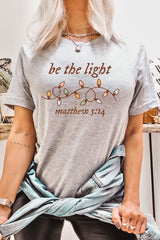US3001-E3214 Be the Light Christian Graphic Tee $12.5