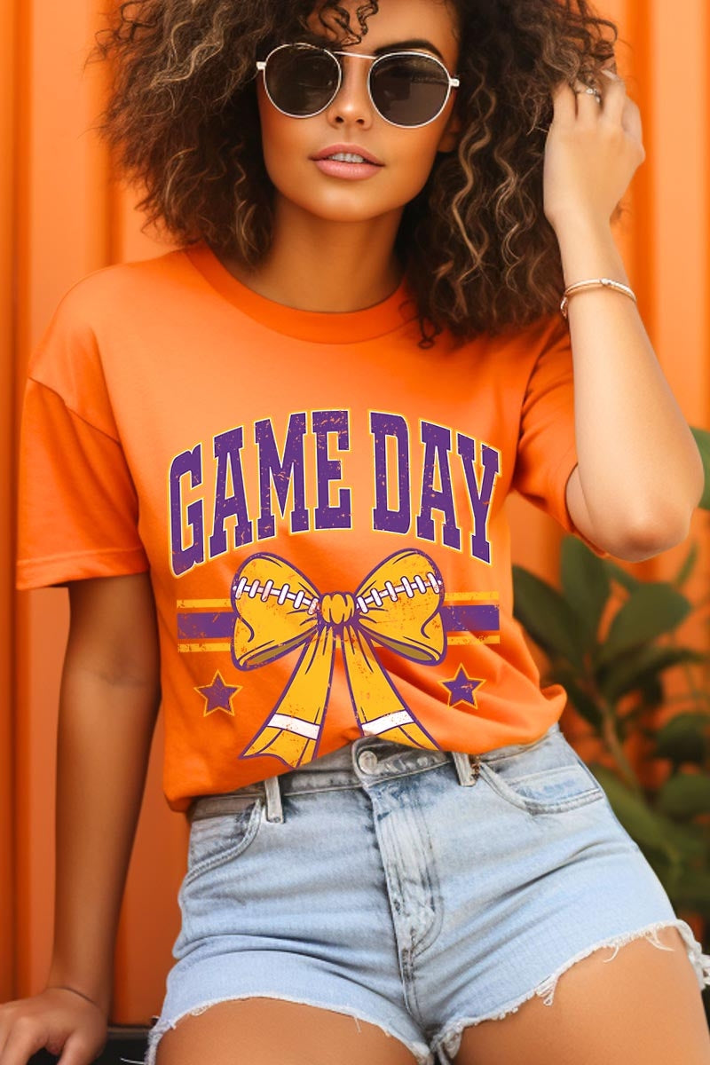 US3001-E3063 Purple Game Day Football Bow Graphic Tee $12.5