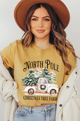 US3001P-E3174 North Pole Christmas Graphic Plus Tee $16