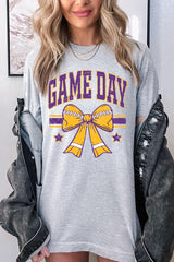 US3001P-E3063 Purple Game Day Football Bow Graphic Plus Tee $16