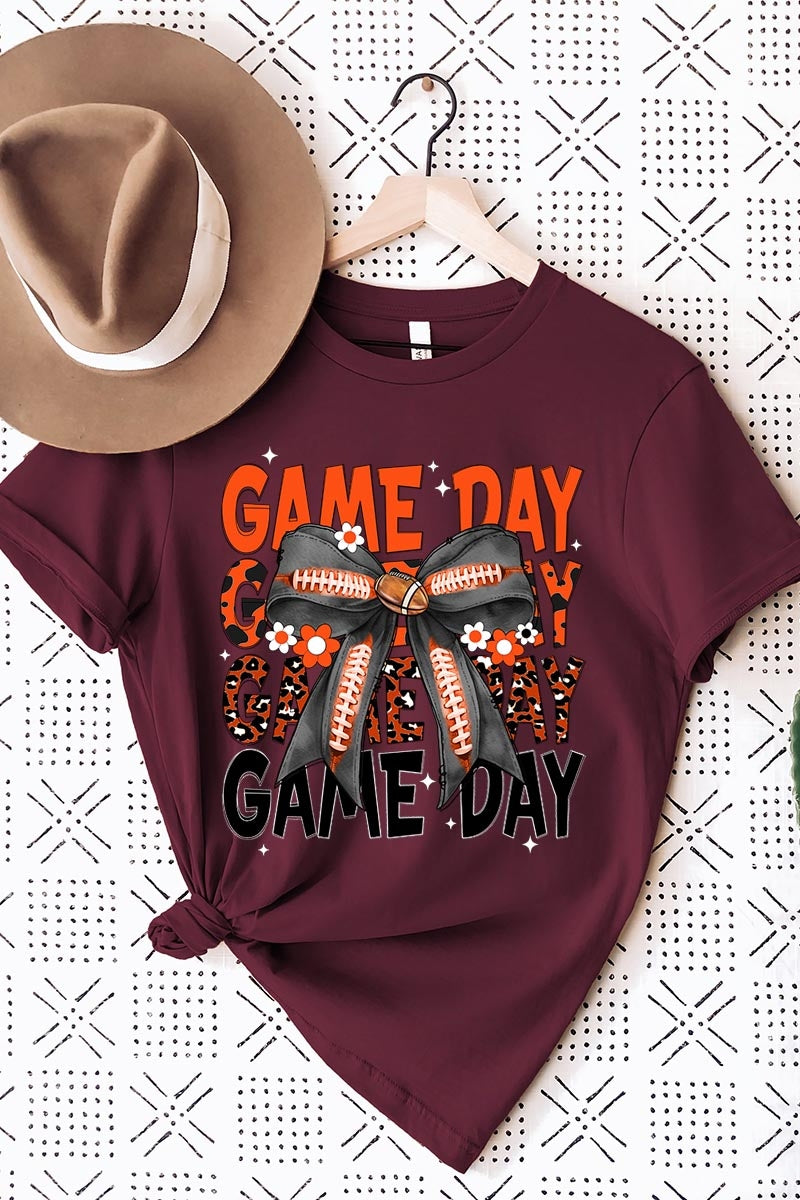 US3001-E3088 Orange Black Football Game Day Bow Graphic Tee $12.5