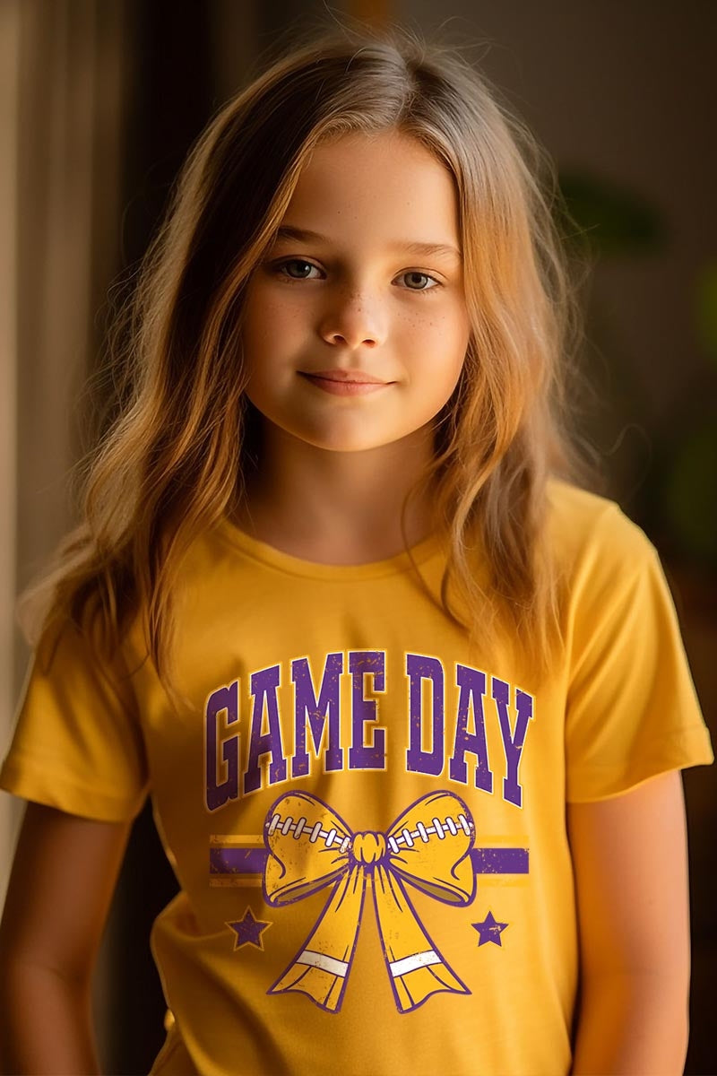 US3001Y-E3063Z Purple Game Day Football Bow Kids Graphic Tee $11