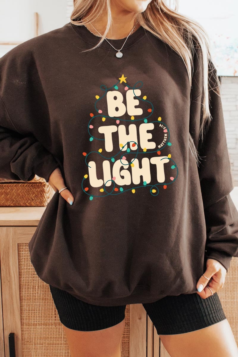 UL180P-E3202 Be the Light Christmas Graphic Plus Sweatshirt $25