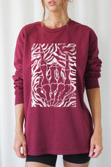 UL240-E3177 Skeleton Hands Zebra Graphic Long Sleeve Tee $13.75