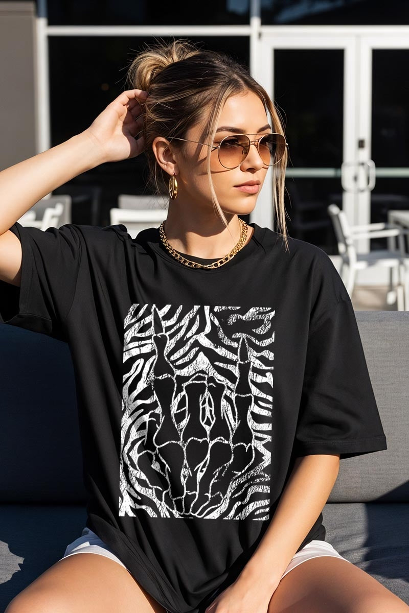 US3001P-E3177 Skeleton Hands Zebra Graphic Plus Tee $16