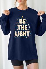 UL240P-E3202 Be the Light Christmas Graphic Plus Long Sleeve Tee $17