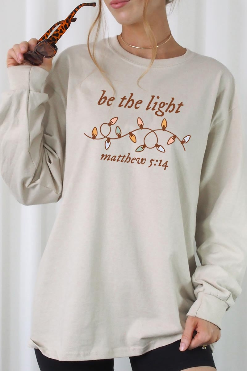 UL240-E3214 Be the Light Christian Graphic Long Sleeve Tee $13.75
