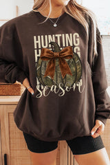 UL180P-E3190 Hunting Pumpkin Bow Graphic Plus Sweatshirt $25
