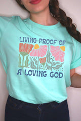 US3001-E3066 Living Proof of a Loving God Graphic Tee $12.5