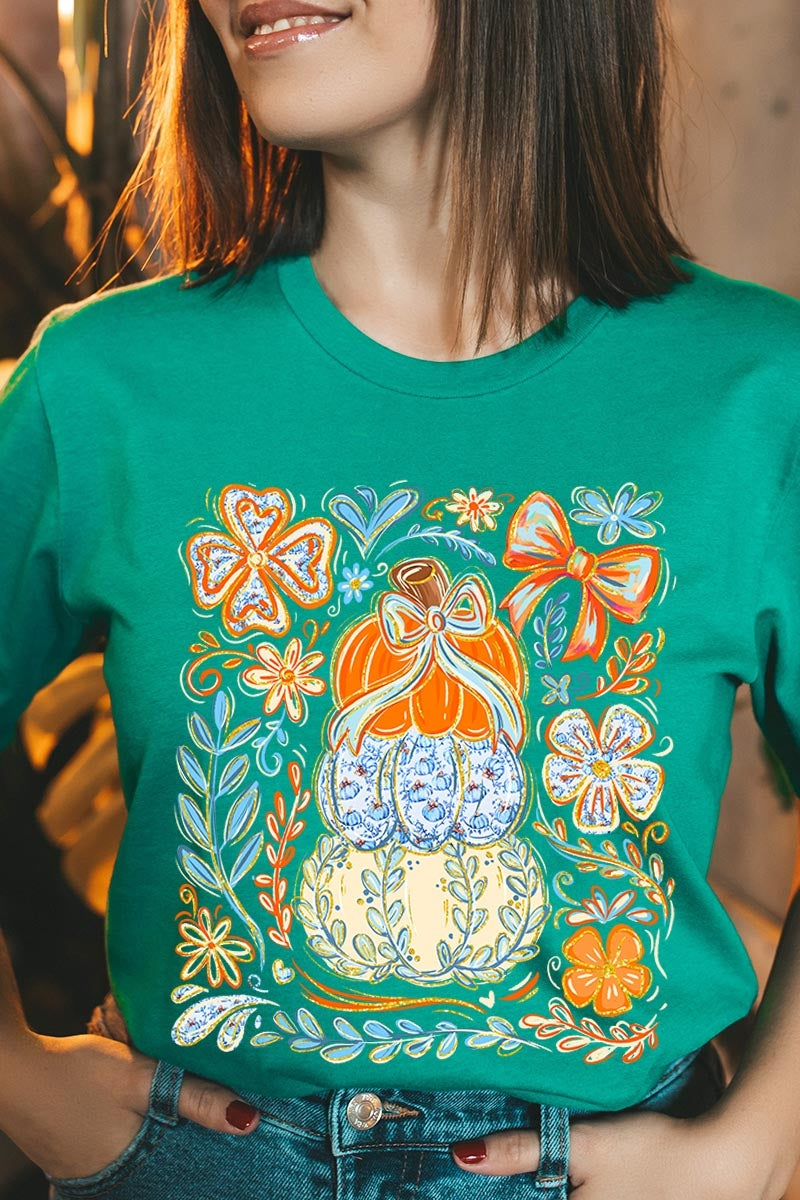 US3001P-E3153 Floral Pumpkin Stack Graphic Plus Tee $16