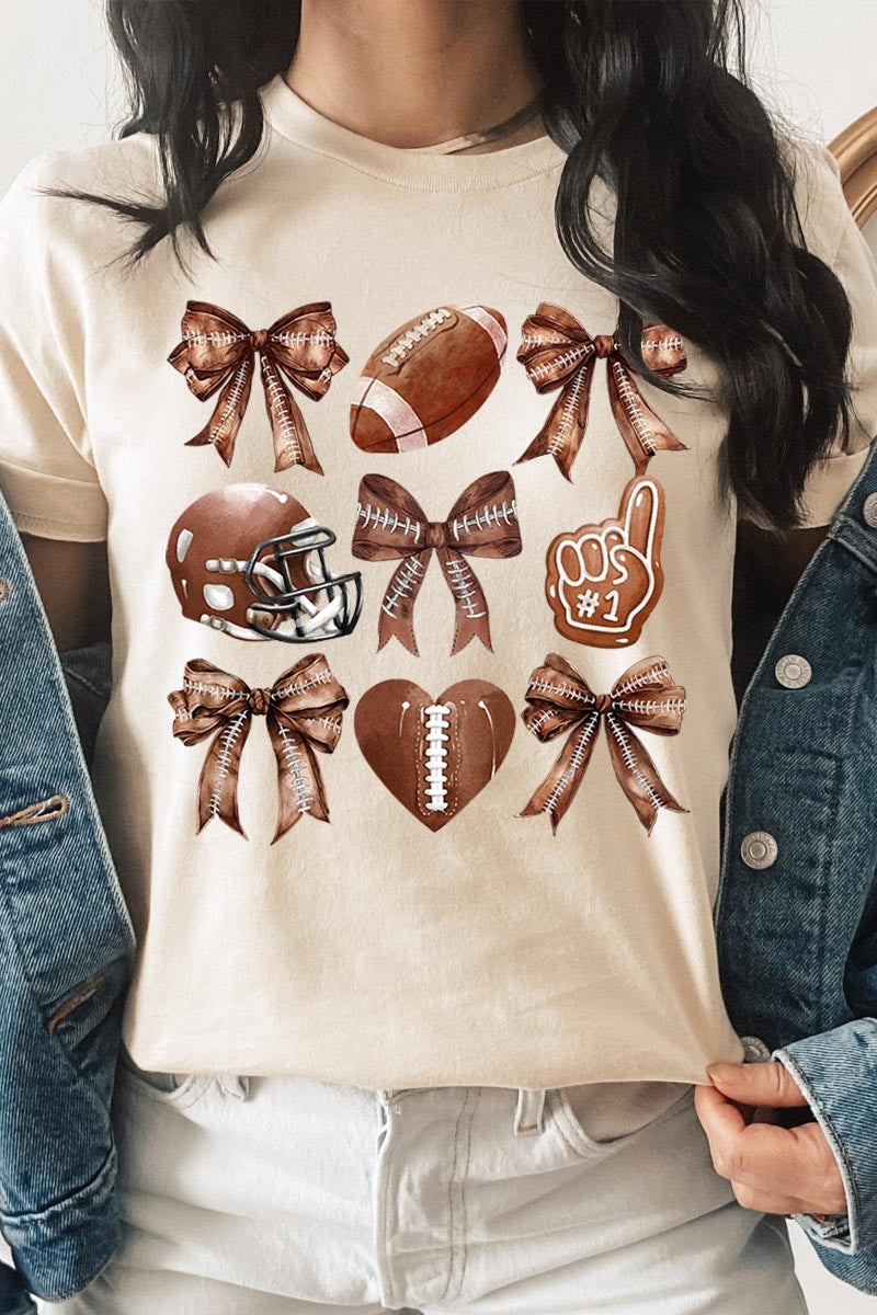 US3001P-E3054 Cute Football and Bow Graphic Plus Tee $16