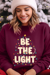 UL180P-E3202 Be the Light Christmas Graphic Plus Sweatshirt $25