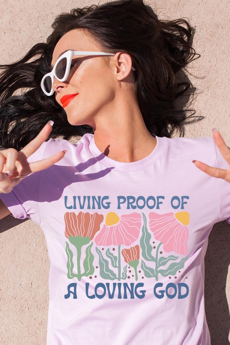 US3001-E3066 Living Proof of a Loving God Graphic Tee $12.5