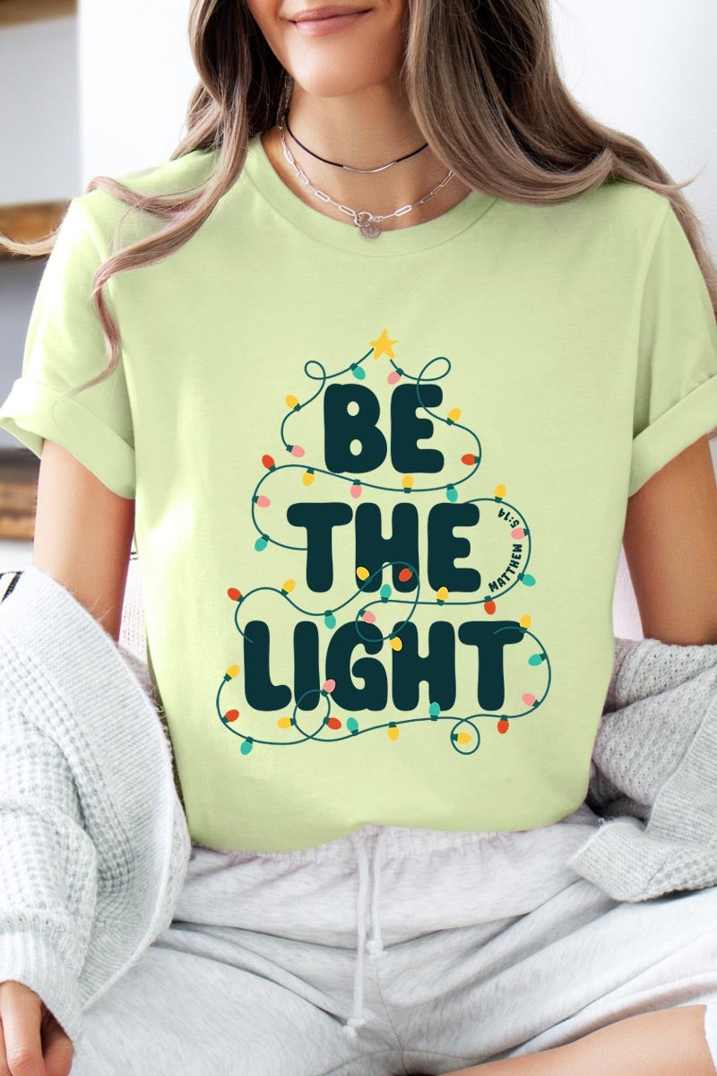 US3001-E3202 Be the Light Christmas Graphic Tee $12.5