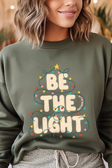 UL180P-E3202 Be the Light Christmas Graphic Plus Sweatshirt $25